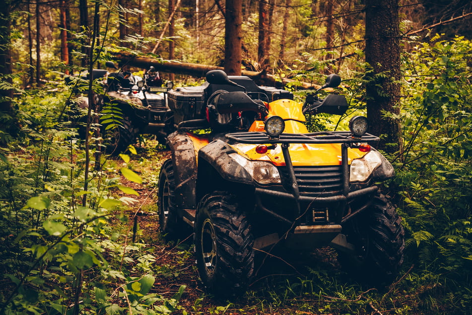 ATV Quad Bike in wild nature landscape